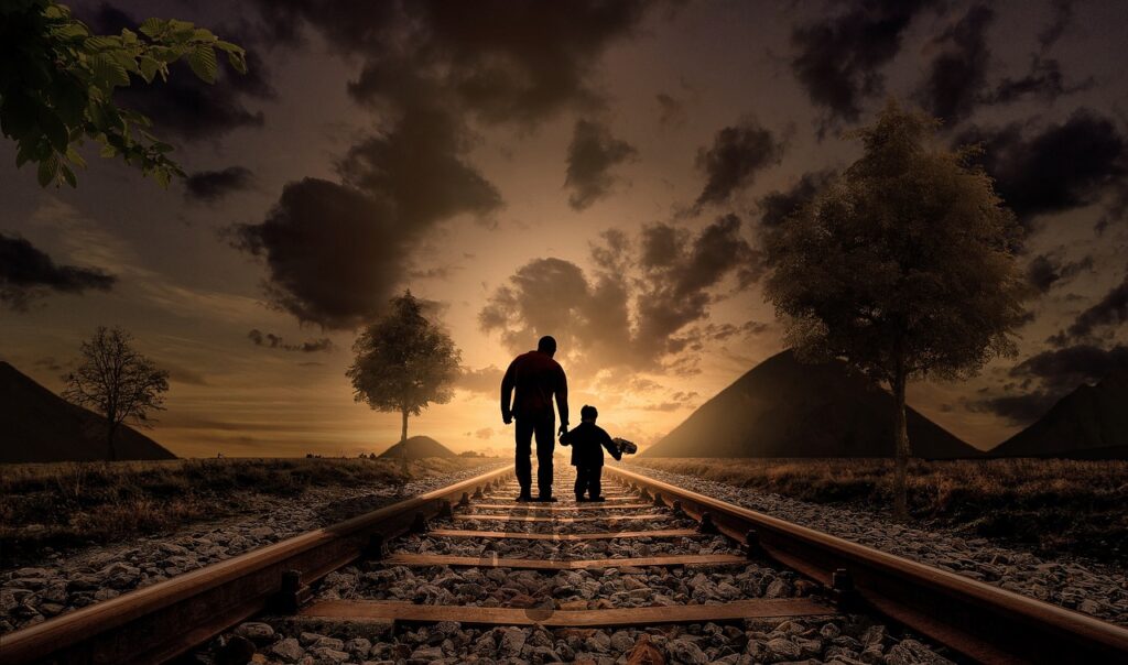 father and son walking railway 2258681
